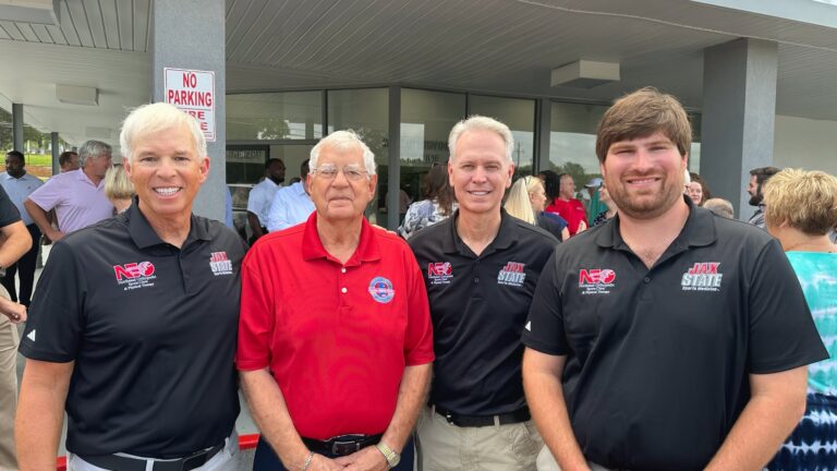 Dr. Douthit, mayor Smith, and doctors Kelley and Read just after the ribbon cutting.